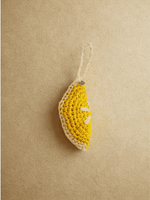 Load image into Gallery viewer, YZA raffia Lemon Slice bag charm with golden engraved tag, handmade in Marrakesh