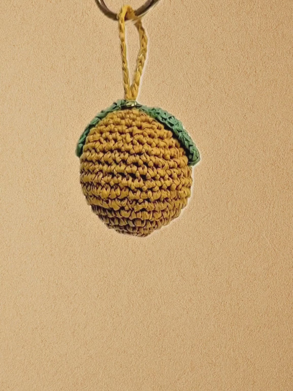 Whole Lemon bag charm, close-ups of stitching and light swing